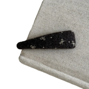 Pinkish brown wool bow hair clip for women featuring elegant handmade autumn winter style