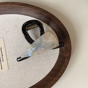 French style acetate claw clip with iridescent triangle inlay and golden spring