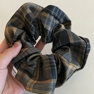 Classic grey and yellow tartan plaid scrunchie with a small decorative brand label