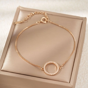 Rose gold copper jewelry set featuring a pavé zircon circle pendant on a box chain bracelet