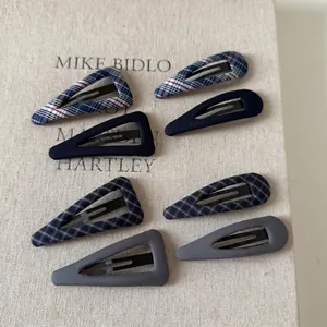 French vintage navy blue plaid hair clips set with classic tartan pattern and solid fabric finish