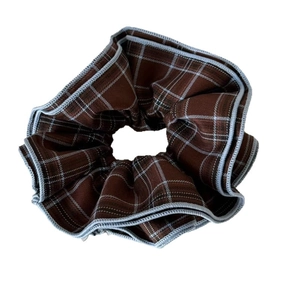 British style plaid scrunchie in brown and white checks with blue stitched edges
