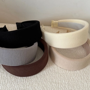Knitted wide padded headband set in coffee cream colors for a high-volume hair look