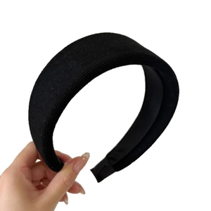 Classic black padded sponge headband with premium thick knit fabric for a high crown look