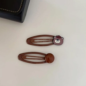 Brown teddy bear hair clips set featuring cute bear with red beret and glossy beads