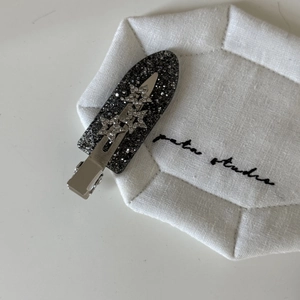 Sparkling black acetate star hair clip with crystals for women's stylish hair styling