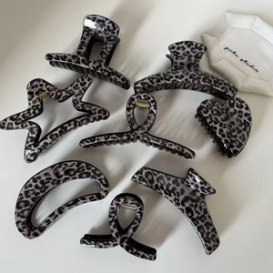 French gray leopard print hair claw clips set in various geometric shapes for women