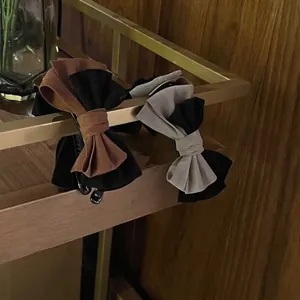 Elegant velvet double layer bow banana hair clip for women in brown and gray