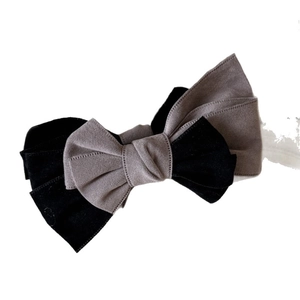Elegant dual-tone velvet bow banana clip in black and dark grey for ponytail styling