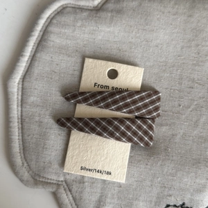 Set of two brown checkered fabric BB hair clips displayed on a white product card