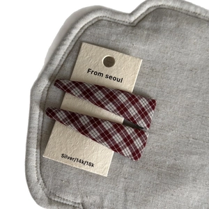Set of 2 sweet red and white plaid fabric hair clips on a stylish display card