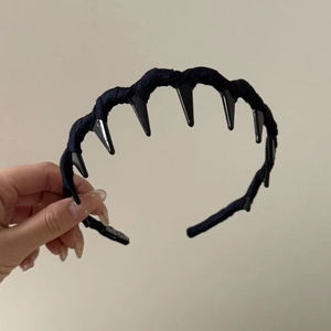Gothic black headband with sharp spikes and non-slip fabric wrap for punk hair styling