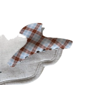 Vintage plaid acetate hair claw clip with brown and blue patterns for elegant hair styling