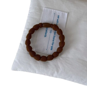 Durable dark brown high-elasticity hair tie with wavy texture and resin connector