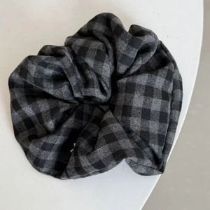 Classic black and gray plaid scrunchie hair tie made of soft fabric for women