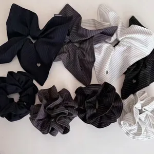 Navy blue heart striped hair scrunchies and bow ties with handmade label decoration