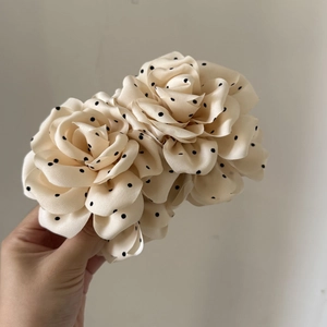 Polka dot rose flower banana hair clip for women featuring cream satin fabric and retro style