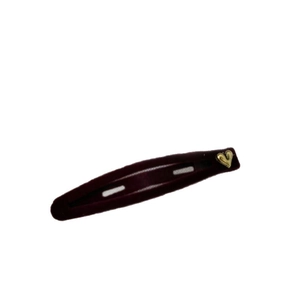 Vintage burgundy velvet hair clip with golden heart detail for women on white background
