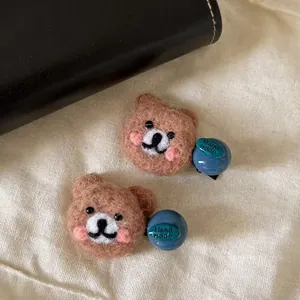 Blue felt bear hair clips for women featuring brown wool bear heads and handmade beads