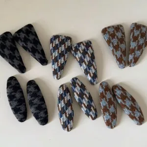 12-piece set of colorful houndstooth wool BB hair clips with classic geometric patterns