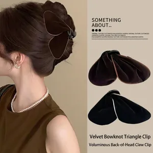 Elegant velvet triangular hair claw clip for women in deep coffee brown with chic bow design