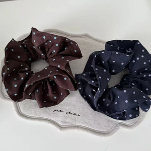 Vintage polka dot chiffon scrunchies in navy and brown for elegant hairstyles