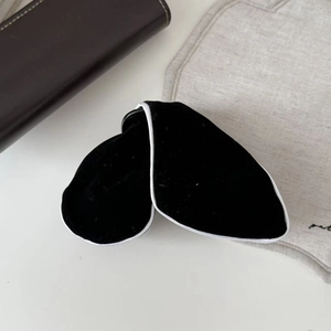 Elegant large black velvet triangular hair claw clip with white trim in French retro style