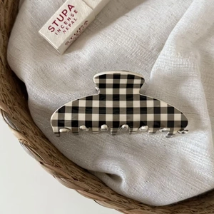 French style checkerboard acetate claw clip with black and white grid pattern design