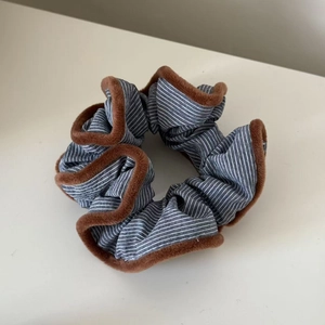 Blue striped scrunchie with brown plush trim for high ponytail styling accessory
