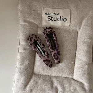 Set of two pink leopard print hair clips with fabric wrap and metal BB clip for women