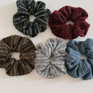 Detailed view of 5-piece knit striped scrunchie set in vintage autumn winter colors