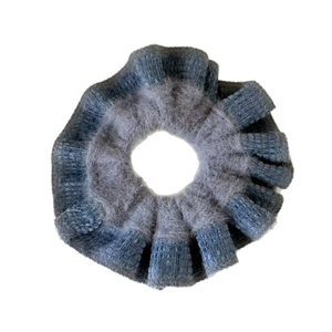 Gray-blue fuzzy knit scrunchie with soft plush texture for stylish hair styling