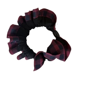 Preppy red and black buffalo plaid elastic scrunchie with ruffled fabric texture