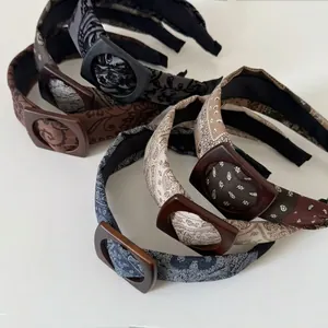 Vintage paisley print headband set with square buckles in assorted retro colors