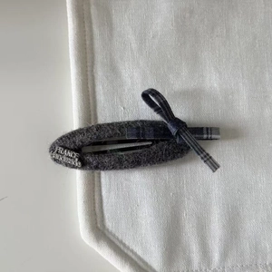 Plaid bow felt hair clip for girls featuring a silver France engraved metal plate