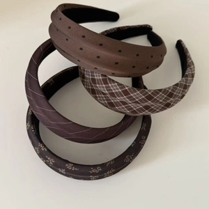 Brown vintage wide headbands set with polka dots, plaid, and floral patterns