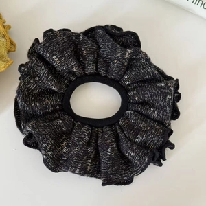 Black and grey knitted scrunchie with soft ruffled texture for daily hair styling