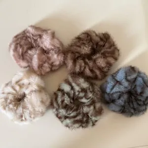 Plush faux fur scrunchies set in leopard print and solid colors for autumn winter style