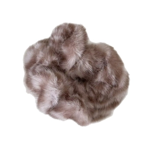 Plush faux fur scrunchie in taupe beige with high elastic band for daily hair styling