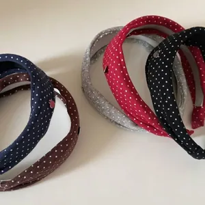 Vintage knitted polka dot headbands set with small heart accents in multiple colors