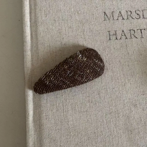 Brown knitted drop-shaped BB hair clip with thick knit texture for girls