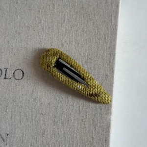 Retro knitted teardrop BB hair clip in ginger yellow with a cozy wool texture