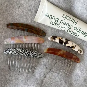 Five-piece acetate hair comb set with marble patterns and silver metal teeth for styling