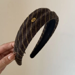Retro brown striped knit wide headband with handmade gold tag and non-slip lining