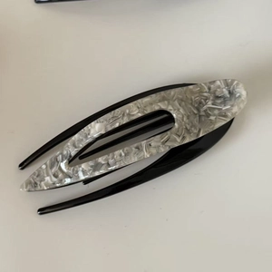 Floral marble acetate barrette hair clip with black base and cutout leaf design