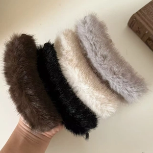 Faux fur banana hair clips set in coffee, black, cream, and grey plush material