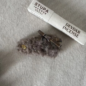 Brown plaid bow and grey plush bear hair clip with a gold handmade tag for women