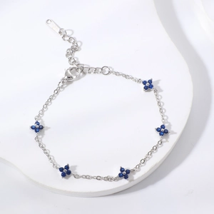 Minimalist silver S925 bracelet with five blue zircon four-petal flowers and extension chain