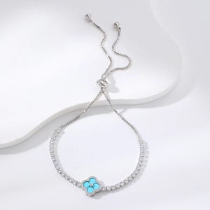 Bracciale quadrifoglio argento con pietre blu e catena tennis regolabile in zirconi
