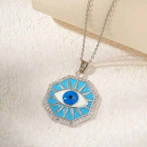 Collier avec pendentif œil maléfique octogonal, émail bleu et cristaux scintillants